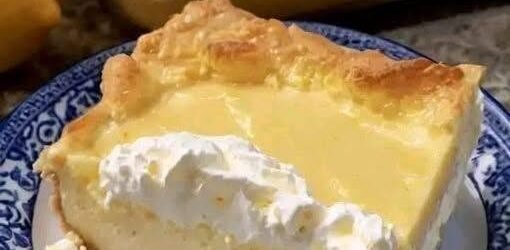 Lemon Cream Cheese Dump Cake with golden topping and creamy lemon filling.