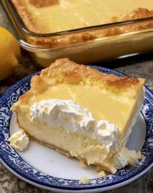 Lemon Cream Cheese Dump Cake with golden topping and creamy lemon filling.